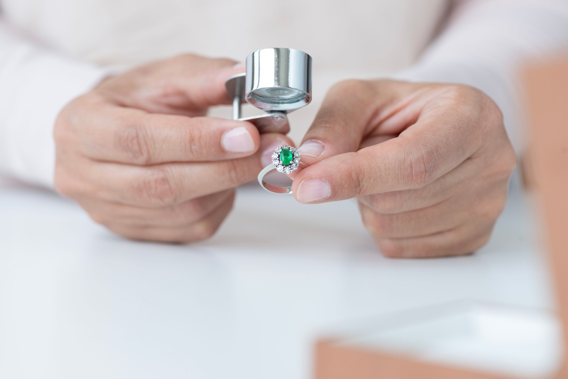 Jeweler Examines Luxury Ring